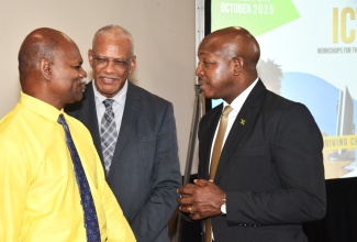 Minister of Labour and Social Security, Hon. Pearnel Charles Jr. ( right), converses with Executive Director of the Jamaica Society for the Blind, Conrad Harris (left), and Director of Stakeholder Engagement at the Caribbean Telecommunications Union (CTU), Trevor Prevatt, during a workshop for persons with disabilities, held on Thursday (October 2), at The Jamaica Pegasus hotel in New Kingston. The workshop was part of the CTU Information and Communications Technology (ICT) Week 2025 activities.

