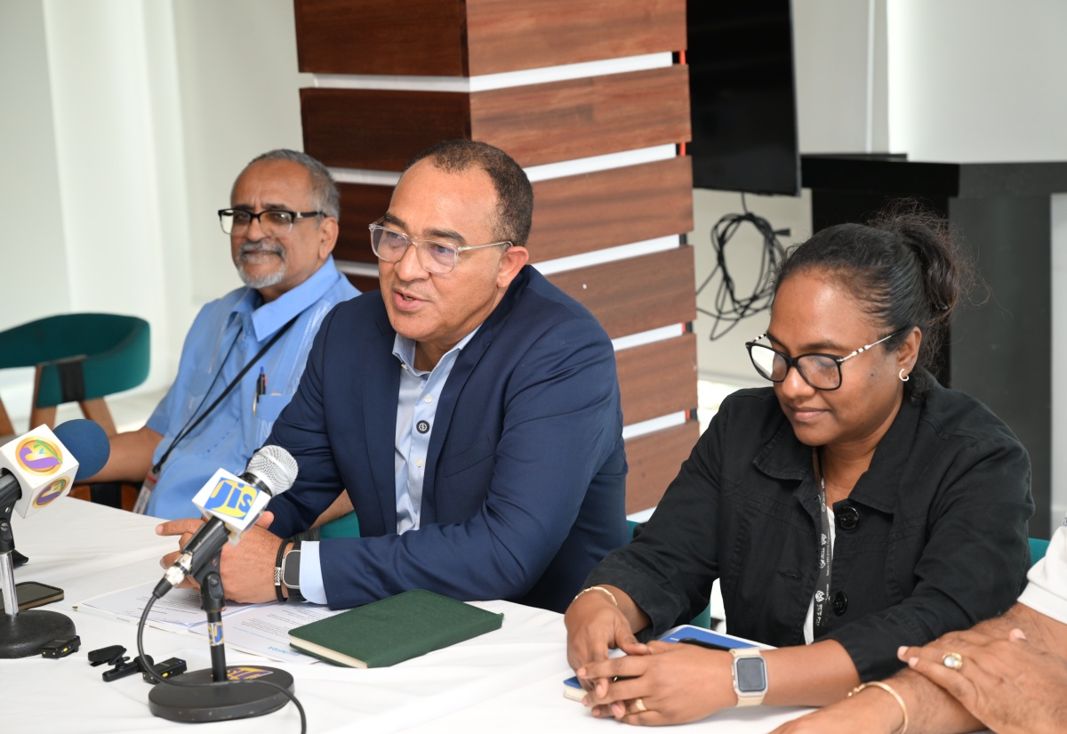 Health and Wellness Minister, Dr. the Hon. Christopher Tufton (centre), addresses a press briefing held at S Hotel in Montego Bay, St. James, on Thursday (October 9). He is joined by Clinical Coordinator at the Western Regional Health Authority (WRHA), Dr. Delroy Fray (left) and Regional Technical Director at the Western Regional Health Authority (WRHA), Dr. Diane Campbell-Stennett.