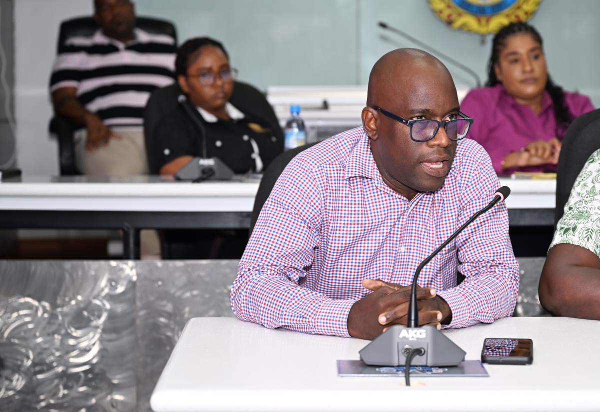 Public Assistance Division (PAD) Administrator at the Ministry of Labour and Social Security, Andrae Earle, addresses the Emergency Operations Centre (EOC) meeting at the St. James Municipal Corporation on Thursday (October 23).
