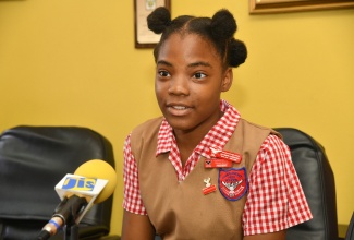 National Tourism Champion and student at the St. Catherine-based Charlemont High School, Kayda Lee McLean, speaks to JIS News on October 7.

