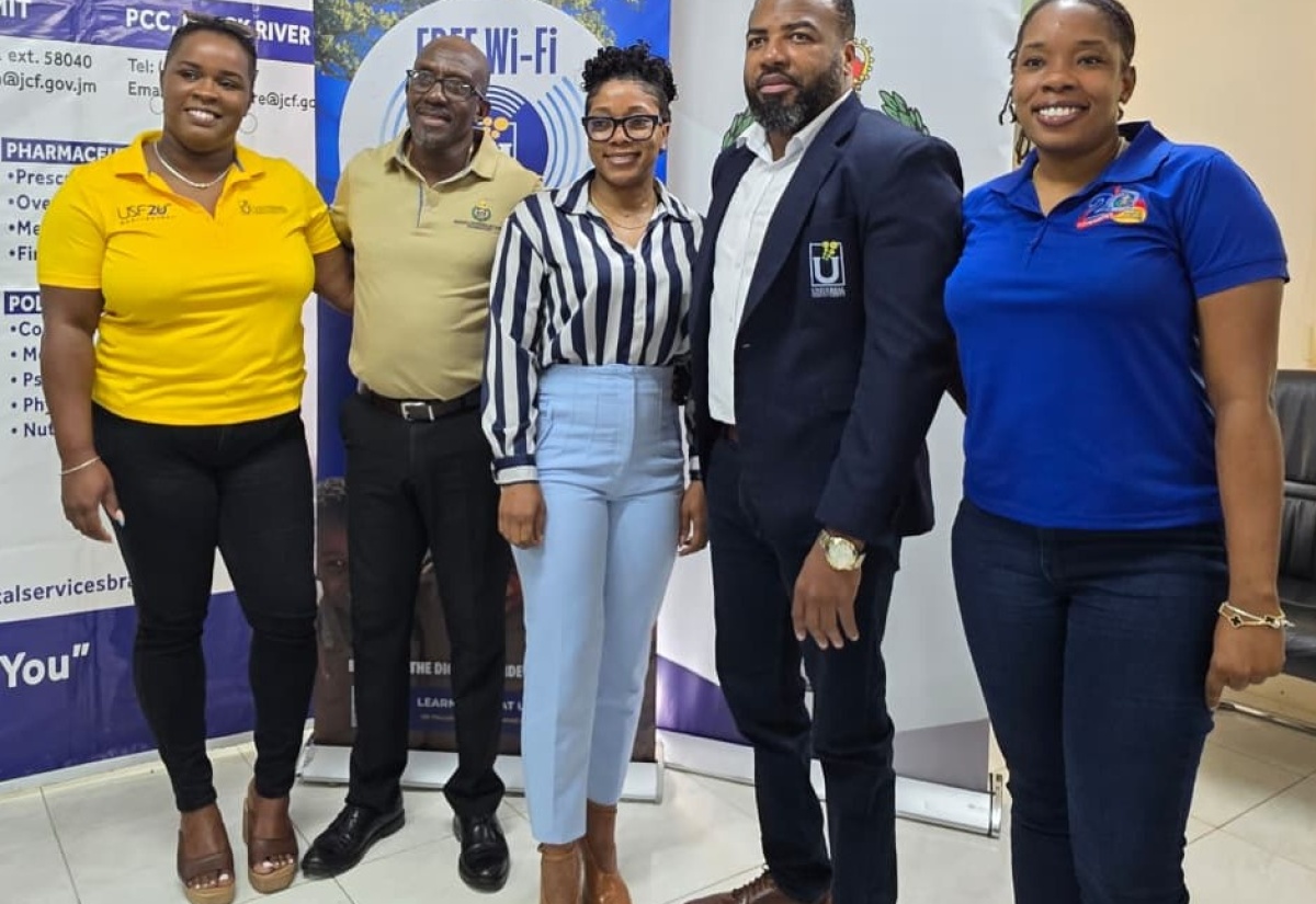 Officials from the Universal Service Fund (USF) and the Jamaica Constabulary Force (JCF) Medical Services Branch mark the handover of digital devices by the USF recently, aimed at enhancing healthcare delivery. From left are Marketing and Public Relations Manager of the USF, Dana DeCordova Denton; Clinical Director in the Jamaica Constabulary Force Medical Services Branch, Dr. George Leveridge; Superintendent of Police and Director of Health Administration and Operations for Nutrition and Dietetics Services in the Branch, Dr. Claudia Campbell; Chief Executive Officer of Universal Service Fund, Charlton McFarlane; and Senior Medical Social Worker in the Branch, Kimberly Graham.

