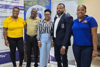 Officials from the Universal Service Fund (USF) and the Jamaica Constabulary Force (JCF) Medical Services Branch mark the handover of digital devices by the USF recently, aimed at enhancing healthcare delivery. From left are Marketing and Public Relations Manager of the USF, Dana DeCordova Denton; Clinical Director in the Jamaica Constabulary Force Medical Services Branch, Dr. George Leveridge; Superintendent of Police and Director of Health Administration and Operations for Nutrition and Dietetics Services in the Branch, Dr. Claudia Campbell; Chief Executive Officer of Universal Service Fund, Charlton McFarlane; and Senior Medical Social Worker in the Branch, Kimberly Graham.

