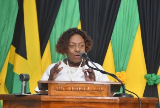 Minister of Culture, Gender, Entertainment and Sport, Hon. Olivia Grange, addresses the congregation during the National Heritage Week Thanksgiving Service, held on Sunday (October 19) at the Church of the Apostolic Faith in Waterloo, Santa Cruz, St. Elizabeth. 
