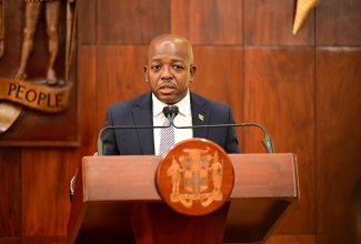 Minister of Labour and Social Security, Hon. Pearnel Charles Jr., addresses a special press briefing on preparations for Tropical Storm Melissa at the Office of the Prime Minister on Wednesday (October 22).