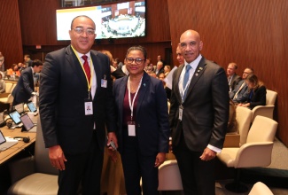 Minister of Health and Wellness, Dr. the Hon. Christopher Tufton (left); Chief Medical Officer, Dr. Jacquiline Bisasor- Mckenzie and Jamaica’s Ambassador to the United States, His Excellency Major General (Rtd) Antony Anderson, share a photo opportunity at the meeting of the 62nd Directing Council of the Pan American Health Organization (PAHO), at the organisation