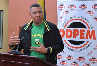 Prime Minister, Dr. the Most Hon. Andrew Holness, responds to a question during a press briefing at the National Emergency Operations Centre (NEOC), located at the Office of Disaster Preparedness and Emergency Management (ODPEM) in Kingston, on October 27.