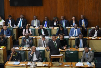 Prime Minister, Dr. the Most Hon. Andrew Holness addresses the opening of the new Parliament and swearing-in ceremony for members of the Senate and the House of Representatives at Gordon House, on September 18. 

