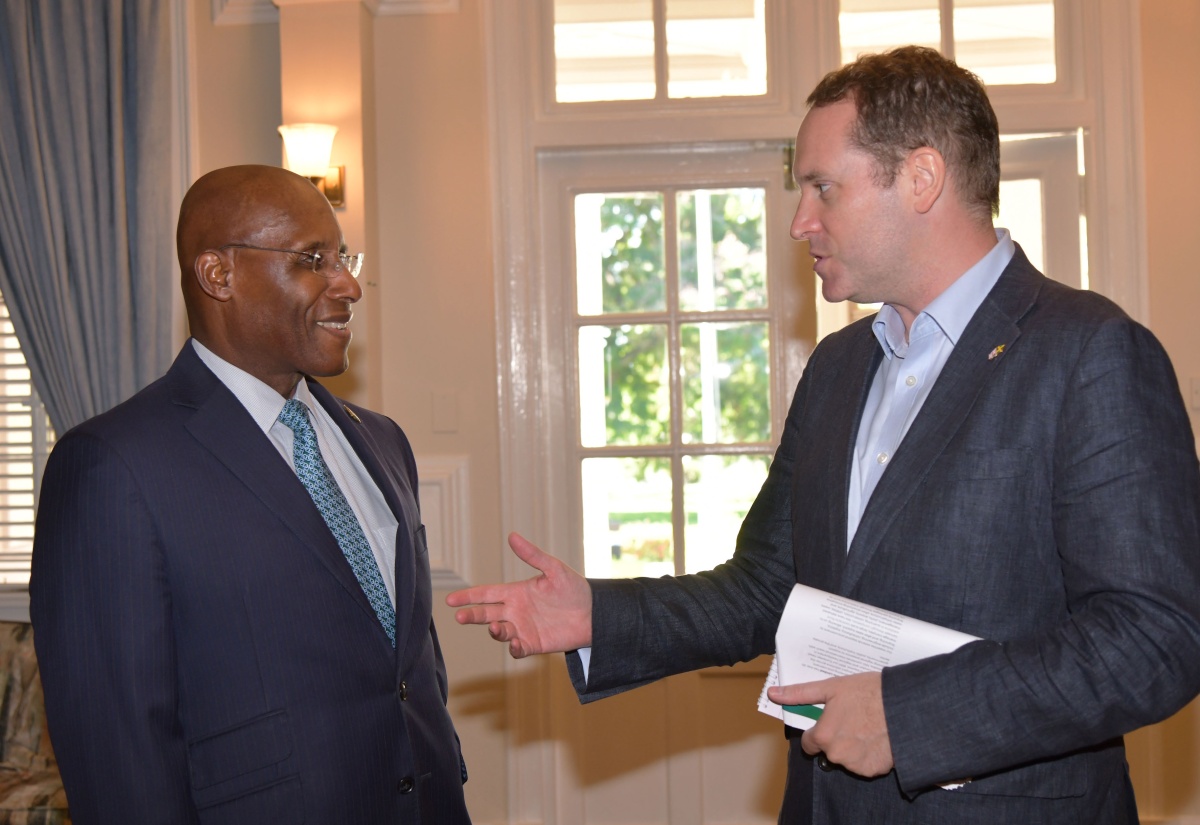 Minister of Industry, Investment and Commerce, Senator the Hon. Aubyn Hill (left), is greeted by Deputy British High Commissioner to Jamaica, Jonathan Cook, during a business briefing and press engagement for the United Kingdon (UK) Trade Mission to Jamaica 2025. The engagement was held at the British High Commission in New Kingston on Wednesday (October 8).