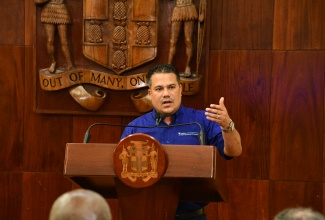 Minister of Water, Environment and Climate Change, Hon. Matthew Samuda, addresses a press briefing at the Office of the Prime Minister on Thursday (October 30).