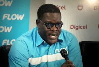 Vice President and General Manager at Flow Jamaica, Stephen Price, addresses a virtual joint utility media briefing on Sunday (Oct. 25).