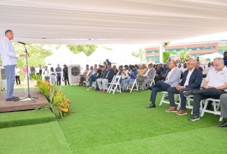 Prime Minister, Dr. the Most Hon. Andrew Holness, addresses the groundbreaking ceremony for a 68,000 square foot three-story Boot 2 commercial complex in Drax Hall, St. Ann, on Friday, October 10.