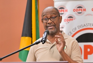 Principal Director of the Meteorological Service of Jamaica (Met Service), Evan Thompson, provides an update on Hurricane Melissa from the National Emergency Operations Centre (NEOC) during a media briefing at the Office of Disaster Preparedness and Emergency Management (ODPEM) in Kingston.