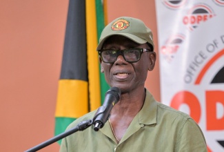 Minister of Local Government and Community Development, Hon. Desmond McKenzie, provides an update on developments related to Hurricane Melissa from the National Emergency Operations Centre (NEOC) during a media briefing at the Office of Disaster Preparedness and Emergency Management (ODPEM) in Kingston.