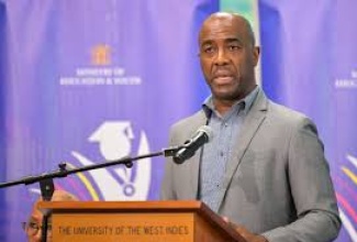 Chairman of the Education Transformation Oversight Committee (ETOC), Dr. Adrian Stokes, making his presentation on the Year-Three, Second Quarter Progress Report on the Transforming Education for National Development (TREND) Programme on Thursday (October 16) at the University of the West Indies (UWI) Regional Headquarters in Kingston.

