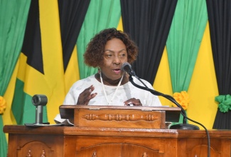 Minister of Culture, Gender, Entertainment and Sport, Hon. Olivia Grange, addresses congregants during the National Heritage Week Thanksgiving Service, held on Sunday (October 19) at the Church of the Apostolic Faith in Waterloo, Santa Cruz, St. Elizabeth.