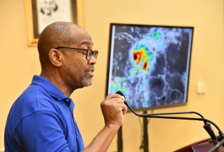 Principal Director of the Meteorological Service of Jamaica (Met Service), Evan Thompson, provides an update on Hurricane Melissa during a special press briefing at Jamaica House on Saturday (Oct. 25). 


