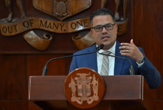 Minister of Water, Environment and Climate Change, Hon. Matthew Samuda, addresses a special press briefing on preparedness for Tropical Storm Melissa at the Office of the Prime Minister on Friday (October 24).
