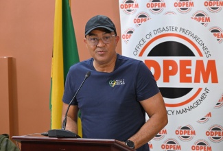 Minister of Health and Wellness, Dr. the Hon. Christopher Tufton, addressing a press briefing at the National Emergency Operations Centre (NEOC) at the Office of Disaster Preparedness and Emergency Management (ODPEM) in Kingston on Monday (October 27).