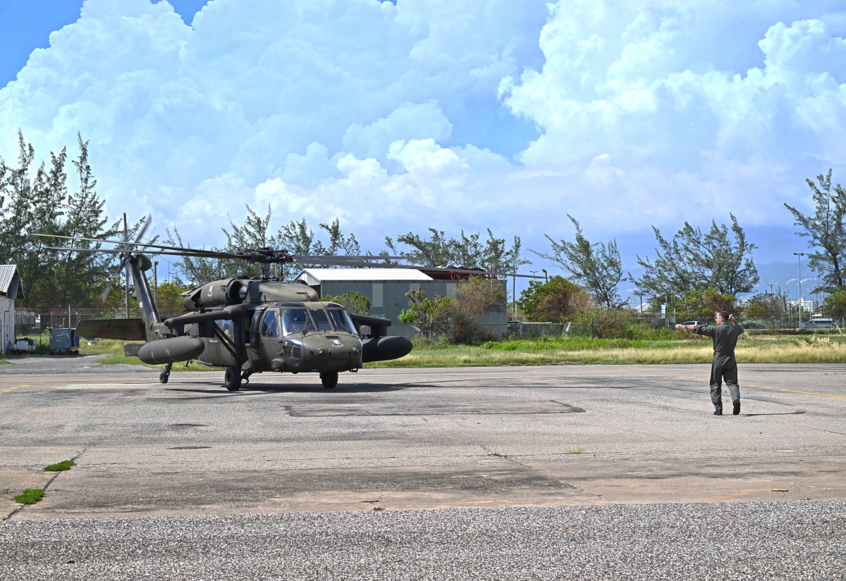 A Black Hawk helicopter carrying additional relief aid support for post-Hurricane Melissa recovery efforts arrives at the Jamaica Defence Force Air Wing, based at Norman Manley International Airport in Kingston on Sunday (November 2).

