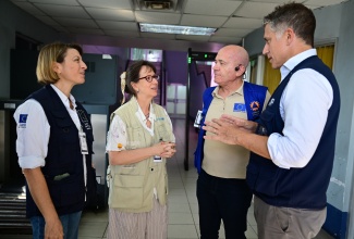 Head of the World Food Programme (WFP), Jamaica Satellite Office, Dana Sacchetti (right), engages in discussion with (from left) European Union (EU) Emergency Coordinator in Jamaica, Daniela D’Urso; Representative for the United Nations Children