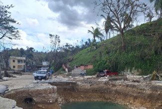 The Chelsea bridge in St. James, which was severely damaged during the recent passage of Hurricane Melissa. 

