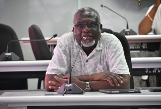 Custos of St. James, Bishop the Hon. Conrad Pitkin, gives remarks during a recent follow-up meeting of the Emergency Operations Centre held at the St. James Municipal Corporation.