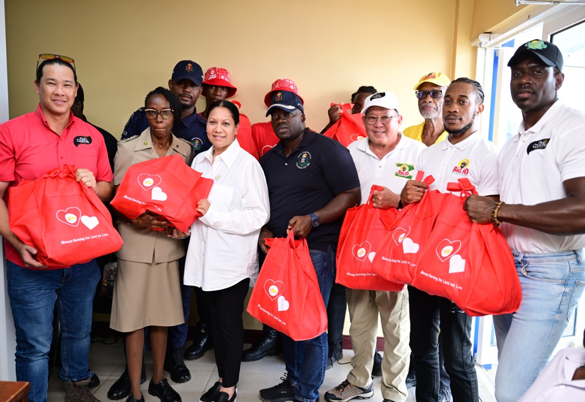 Custos of Clarendon Hands Over Prefabricated Houses to Two Families In St. Elizabeth