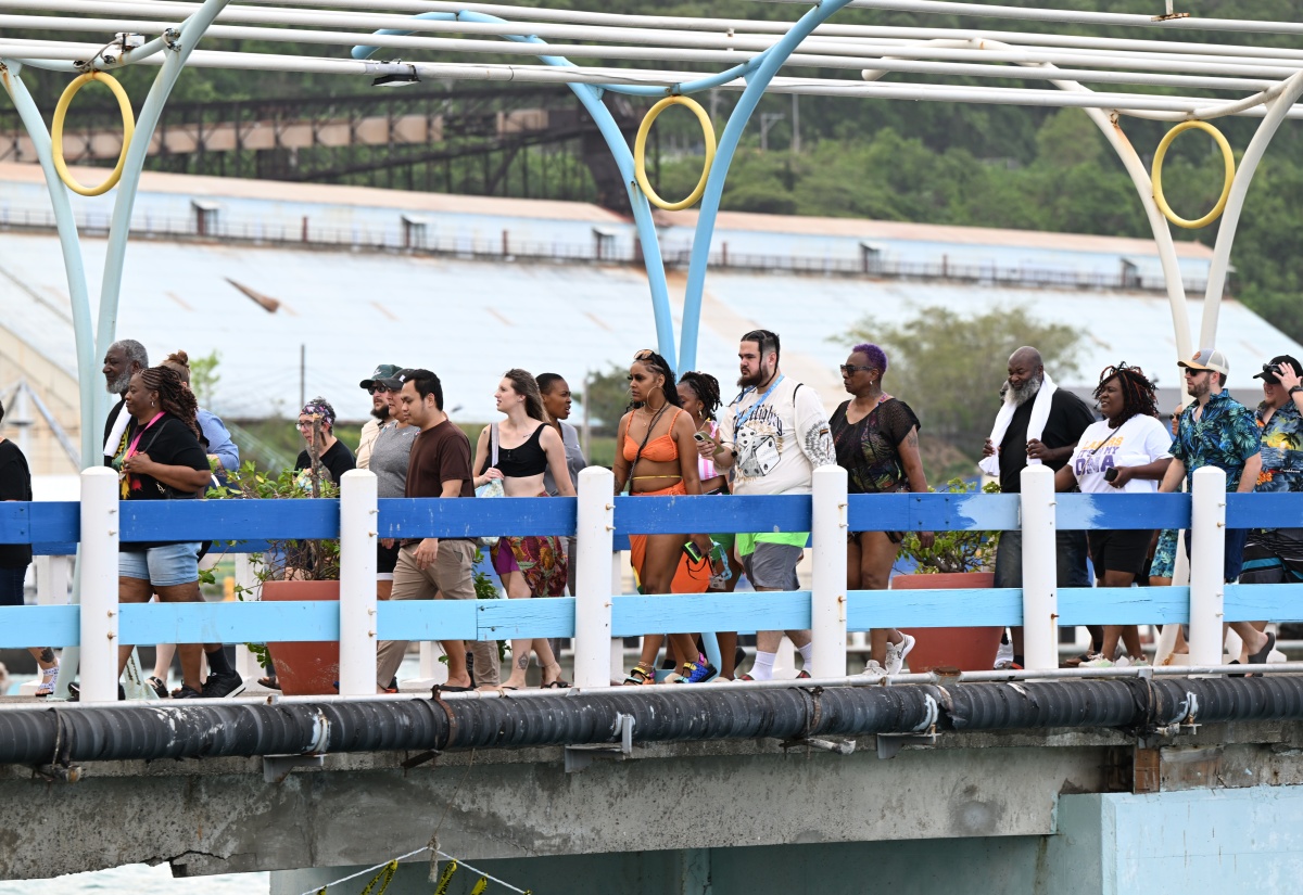 Cruise passengers on Carnival Sunrise make their way along the reopened main terminal at Ocho Rios Port in St. Ann, on Wednesday, November 12.

