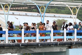 Cruise passengers on Carnival Sunrise make their way along the reopened main terminal at Ocho Rios Port in St. Ann, on Wednesday, November 12.