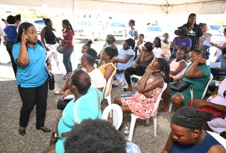 Nursing Coordinator in Ministry of Health and Wellness, Anthonette Patterson Bartley, engages expecting mothers, during a maternal health outreach at the Black River Health Centre in St. Elizabeth on Friday, November 21.