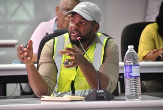 Mayor of Montego Bay, Councillor Richard Vernon, addresses a recent meeting of the Emergency Operations Centre (EOC) at the St. James Municipal Corporation in Montego Bay.