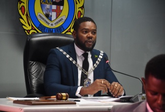 Mayor of Montego Bay, Councillor Richard Vernon, addresses the monthly meeting of the St. James Municipal Corporation, in Montego Bay, on Thursday ( November 13). 

