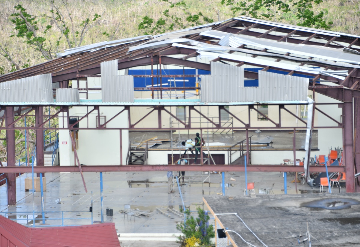 Volunteers repair a building at Westwood High School for Girls in Trelawny during a repair and clean-up exercise at the school on Friday (November 21). 

