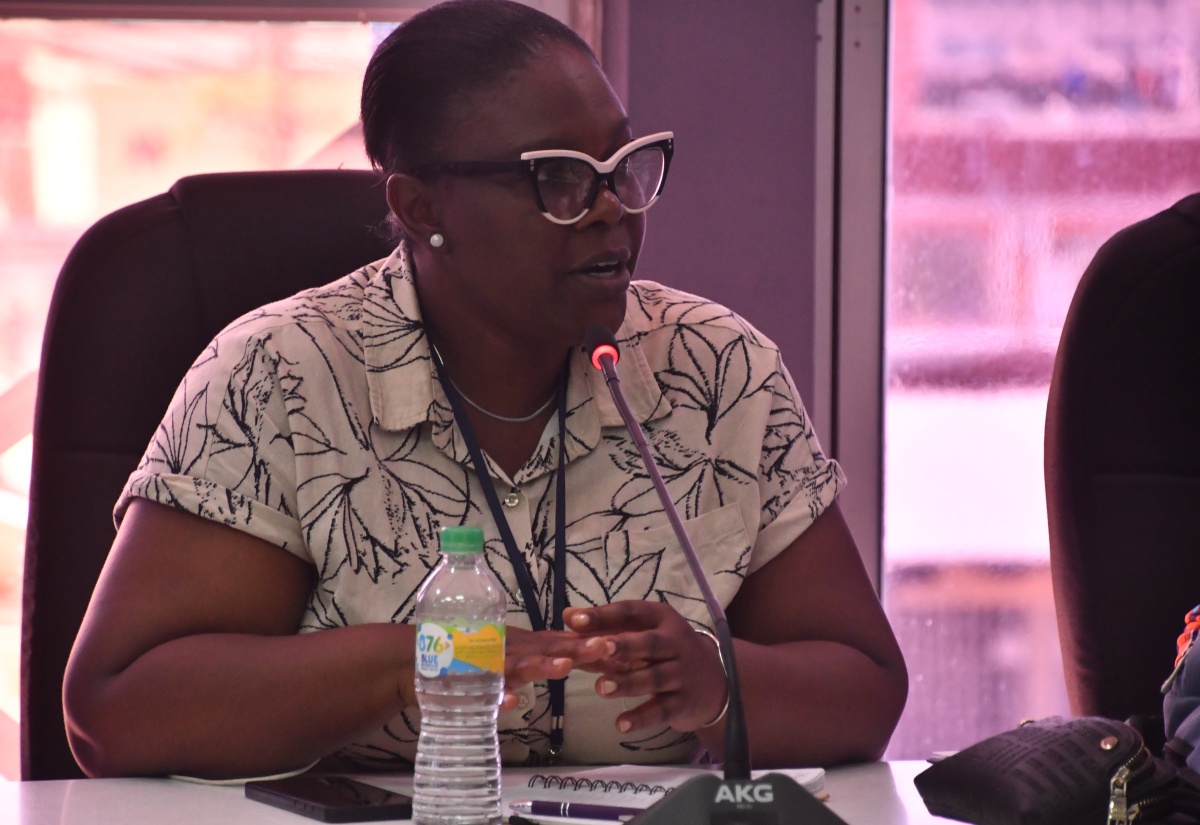 Acting Chief Public Health Inspector for St. James, Sherika Lewis, addresses an Emergency Operations Centre meeting held at the St. James Municipal Corporation is Montego Bay on Thursday (November 6). 

