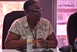 Acting Chief Public Health Inspector for St. James, Sherika Lewis, addresses an Emergency Operations Centre meeting held at the St. James Municipal Corporation is Montego Bay on Thursday (November 6). 

