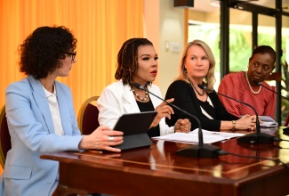 Minister without Portfolio in the Office of the Prime Minister with responsibility for Efficiency, Innovation and Digital Transformation, Ambassador Audrey Marks (second left) addresses a press briefing , at the Office of the Prime Minister in Kingston on Sunday (November 9). Looking on (from left) are European Commissioner for Equality, Preparedness and Crisis Management, Her Excellency, Hadja Lahbib; European Union (EU) Ambassador to Jamaica, Her Excellency Dr. Erja Askola and Permanent Secretary in the Ministry of Foreign Affairs and Foreign Trade, Ambassador Sheila Sealy Monteith (right). The press briefing followed a meeting regarding humanitarian support for Jamaica in the aftermath of Hurricane Melissa.