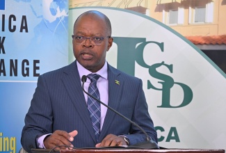 Chief Executive Officer of the Jamaica Stock Exchange (JSE), Livingston Morrison, addresses the JSE Market Research Awards held on Thursday (November 20) at the JSE’s Harbour Street offices in Kingston.