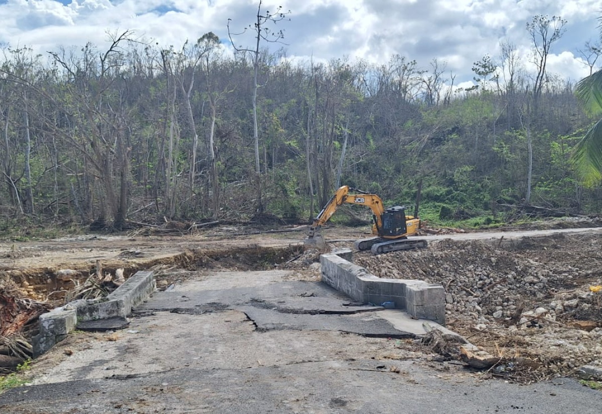 NWA Repairing Sign Main Road in St. James