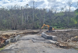 Restoration work in progress along the Sign main road in St. James. 

