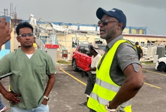 Senior Medical Officer of the Savanna-la-Mar Public General Hospital in Westmoreland, Dr. Suman Vemu (left), and Chief Executive Officer, Roan Grant, have expressed gratitude to healthcare workers who journeyed to the facility on Sunday (November 2), as part of the Ministry of Health and Wellness’ Solidarity Cleanup Exercise. Under the initiative, more than 200 volunteers, including Ministry representatives, travelled to Falmouth, Cornwall Regional, Noel Holmes, and Savanna-la-Mar Hospitals to assist with cleanup efforts following Hurricane Melissa’s passage on October 28.