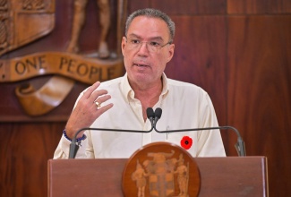 Minister of Energy, Transport and Telecommunications, Hon. Daryl Vaz, provides an update on Hurricane Melissa relief efforts during a press conference at Jamaica House on Tuesday (November 11).

