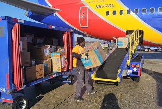 Southwest Airlines cargo representative pack relief supplies for shipment to Jamaica at the Baltimore International Airport in the United States (US). The shipment, which consists of supplies for persons severely impacted by Hurricane Melissa, arrived in the island on November 8. The items were donated by Jamaicans in the US and friends of the island.