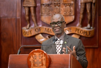 Minister of Local Government and Community Development, Hon. Desmond McKenzie, addresses a special media briefing on Hurricane Mlissa recovery at Jamaica House on Monday, November 3.