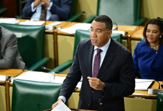 Prime Minister, Dr. the Most. Hon. Andrew Holness, speaks in the House of Representatives on Tuesday (December 9).

