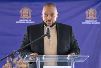 Assistant General Manager in charge of Engineering and Contract Monitoring at the National Housing Trust (NHT), Alex Bernard, gives remarks during the opening ceremony for the Little London Police Station in Westmoreland on November 28. 

