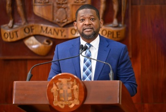 Director General, Office of Disaster Preparedness and Emergency Management (ODPEM), Commander Alvin Gayle, addresses post-Cabinet press briefing at Jamaica House on December 3.

