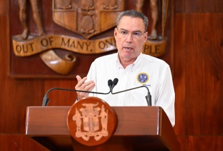 Energy, Telecommunications and Transport Minister, the Hon. Daryl Vaz addresses a recent post Cabinet press briefing on Hurricane Melissa recovery activities at Jamaica House.