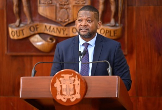 Director General of the Office of Disaster Preparedness and Emergency Management (ODPEM), Commander Alvin Gayle, addresses Wednesday’s (December 10) Post-Cabinet Press Briefing at Jamaica House.