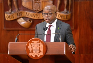 Minister of Labour and Social Security, Hon. Pearnel Charles Jr., addresses Wednesday’s (December 10) Post-Cabinet Press Briefing at Jamaica House.

