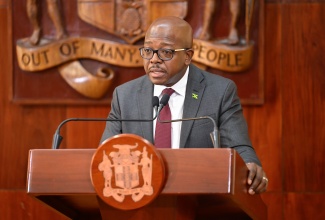 Minister of Labour and Social Security, Hon. Pearnel Charles Jr., addresses Wednesday’s (December 10) post-Cabinet Press Briefing at Jamaica House.

